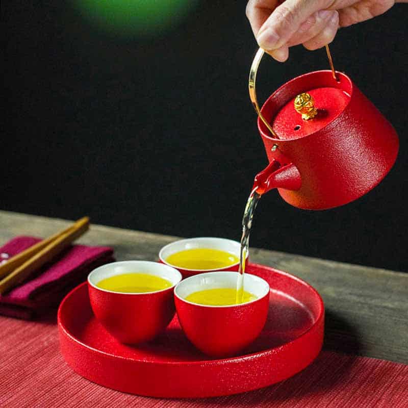 red teapot and teacup set for weddings