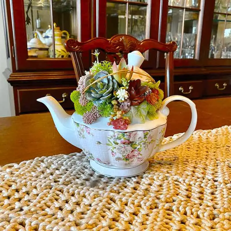 christmas teapot with faux succulent